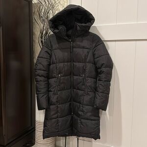 Black Women’s long puffer coat.